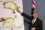 Resource Minister Martin Ferguson showing the expansion of the continental shelf.