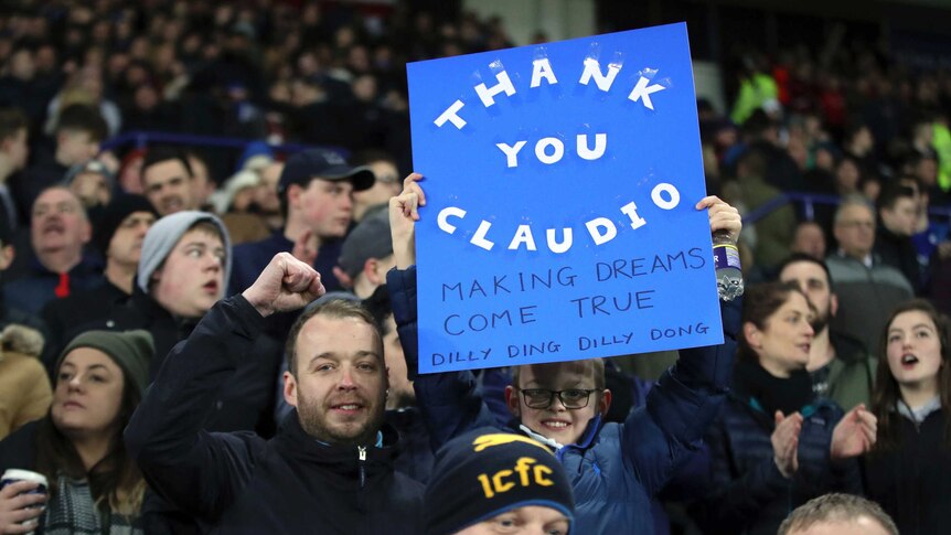 Leicester fans with a banner of support for ex-manager Claudio Ranieri, in match against Liverpool.