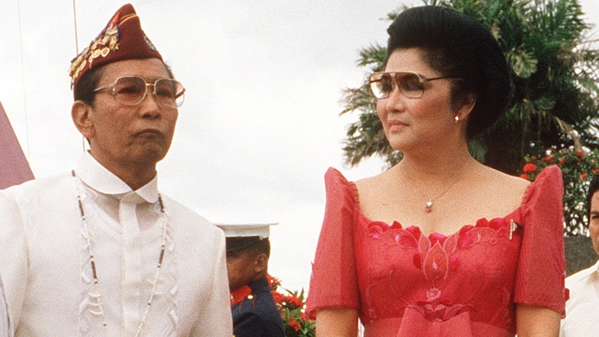 Ferdinand  Marcos and Imelda Marcos, who is dressed in an opulent, floor length fuchsia gown