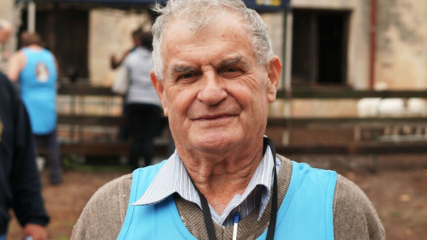 Lance Degahardt smiles outside the Glencoe woolshed.