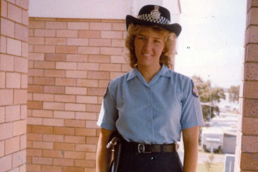 A young Katarina Carroll in her police uniform