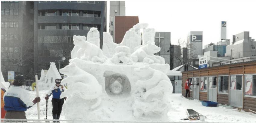 A sculpture made out of snow that features the shapes of Tasmanian devils.