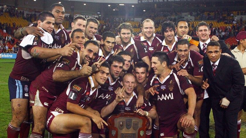 The Maroons celebrate with the 2007 State of Origin shield