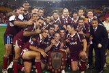 The Maroons celebrate with the 2007 State of Origin shield