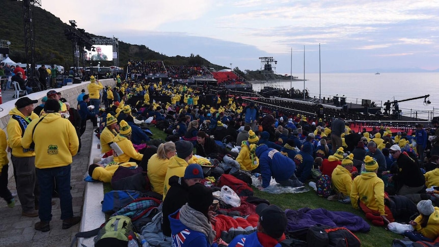 People at Anzac Cove at dusk.