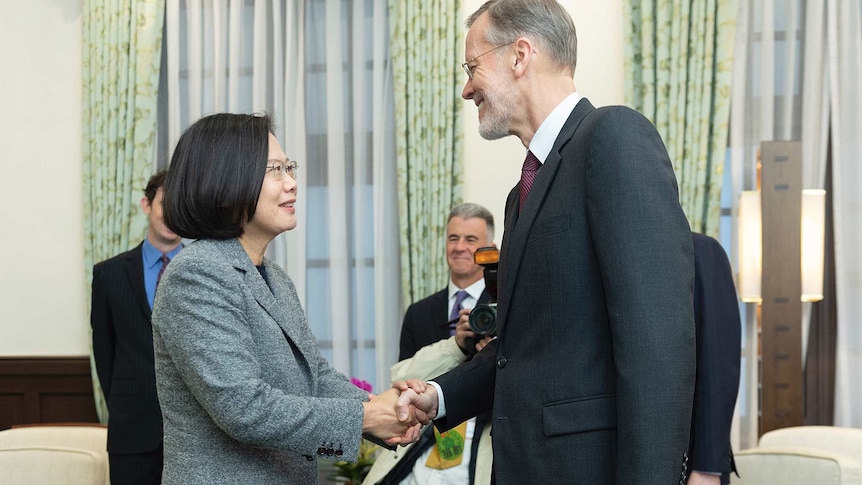 Director of the American Institute in Taiwan at right meets with Taiwan President Tsai Ing-wen, at left.