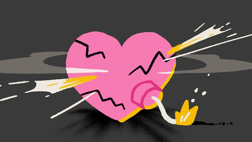 A pink heart against a black background in the shape of a bomb that is about to explode.