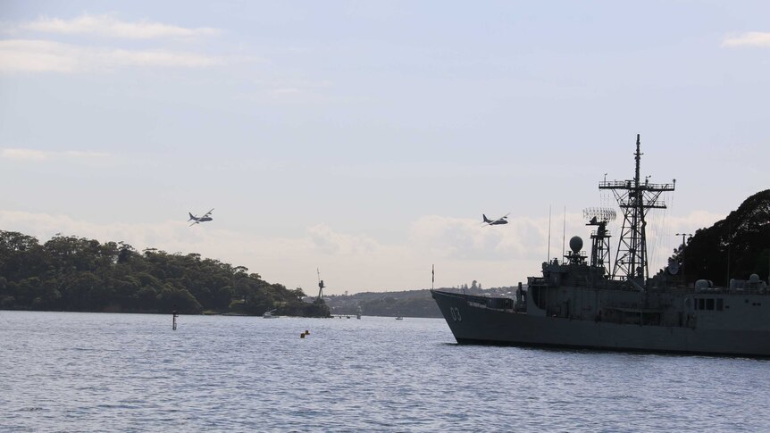 Hercules planes fly over Sydney