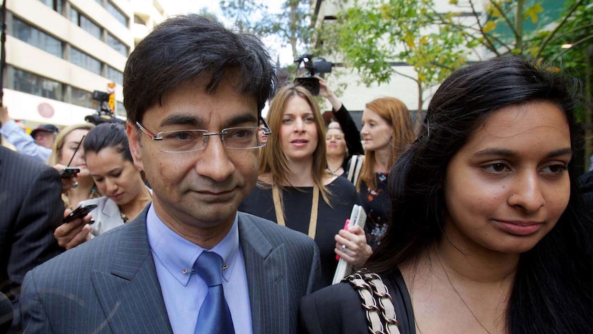 Lloyd Rayney (left) arrives at court in Perth