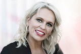 Beccy Cole headshot, blonde woman smiling