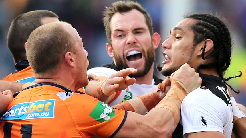 Martin Taupau in a scuffle against Newcastle