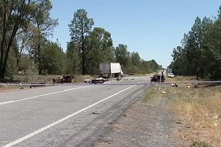 TV still of debris strewn across a road near Narrandera