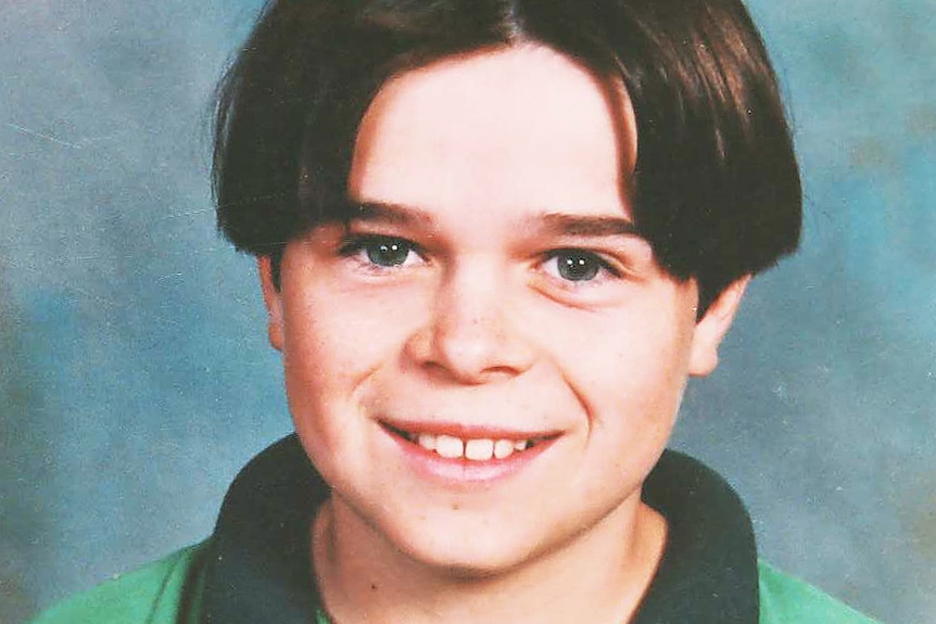 A head and shoulders school profile shot of a smiling Gerard Ross.