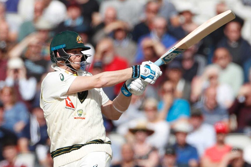 Australia batsman Steve Smith in the midst of a pull shot during the Ashes Test at Old Trafford.