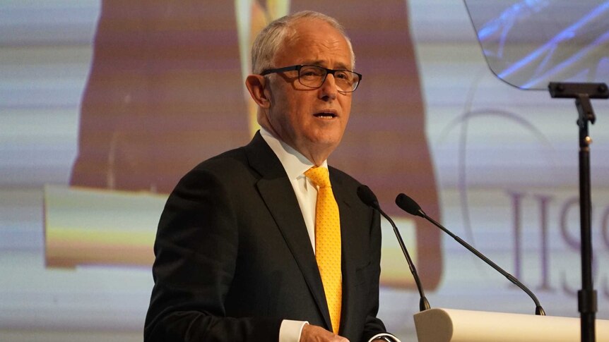 Malcolm Turnbull speaks at a podium at the Shangri-La dialogue.