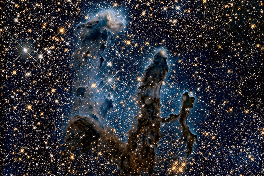 An infrared image of the Pillars of Creation taken by the Hubble Telescope