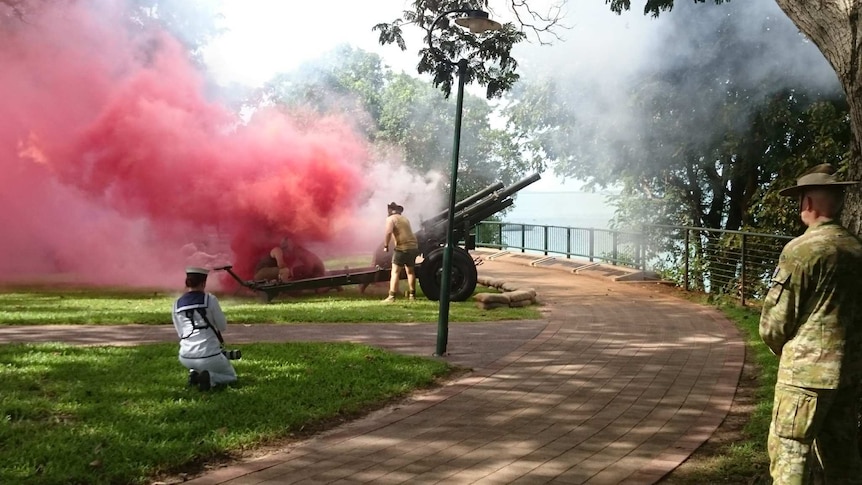 Soldiers re-enact the bombing of Darwin during the 75th anniversary commemoration.