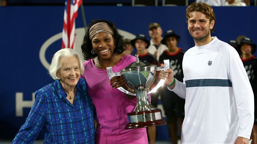 Lucy Hopman poses with Serena Williams and Mardy Fish