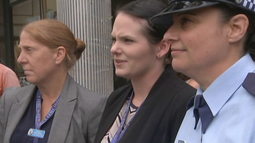Senior Constable Amy Champion (centre) suffered severe injuries when a truck careered into several cars at Dee Why in 2014.
