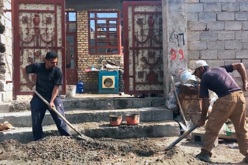 Two men are working to rebuild Fallujah.