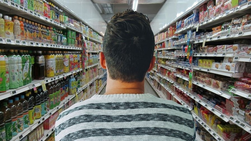 Photo of a man in a supermarket 