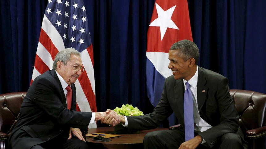 US president Barack Obama and Cuban president Raul Castro shake hands