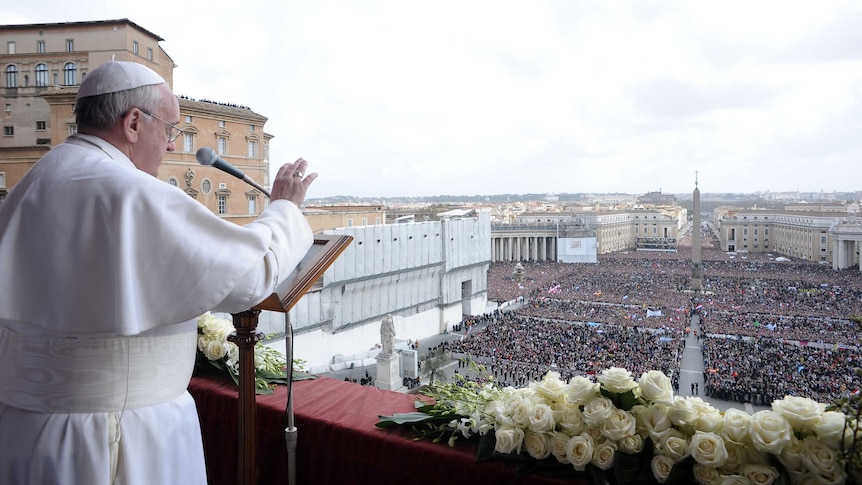 Pope Francis delivers the Urbi et Orbi blessing from St Peter's Basilica.