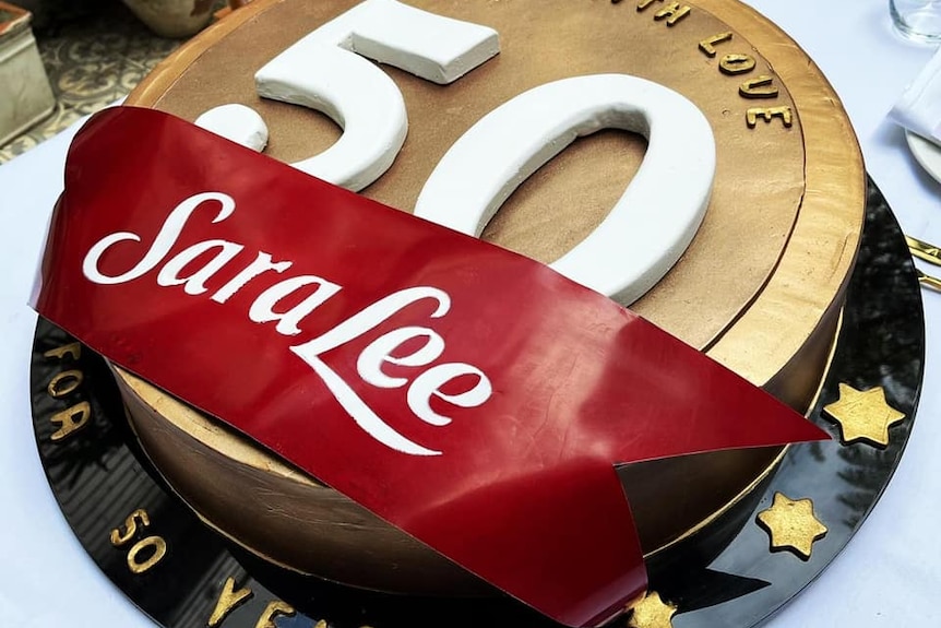 A cake with Sara Lee's branding and the number 50 on it