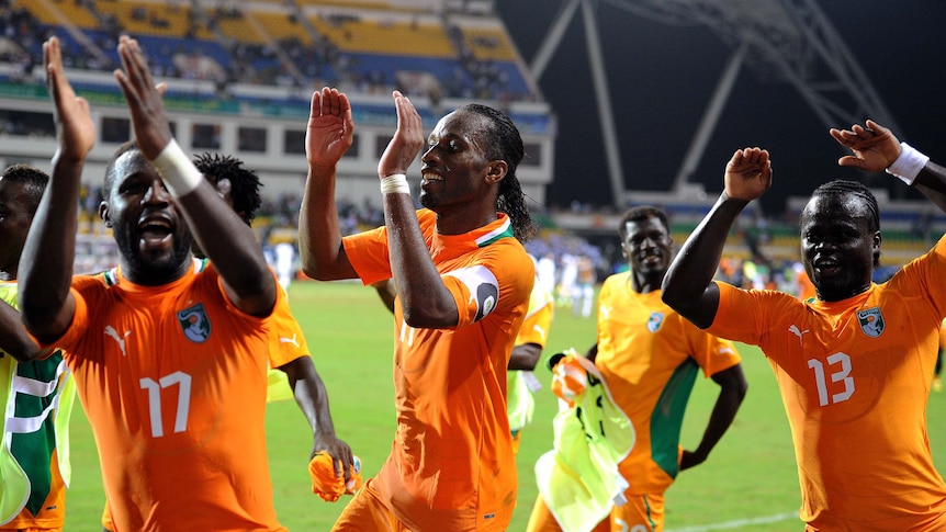 Ivory Coast players celebrate their win over Mali