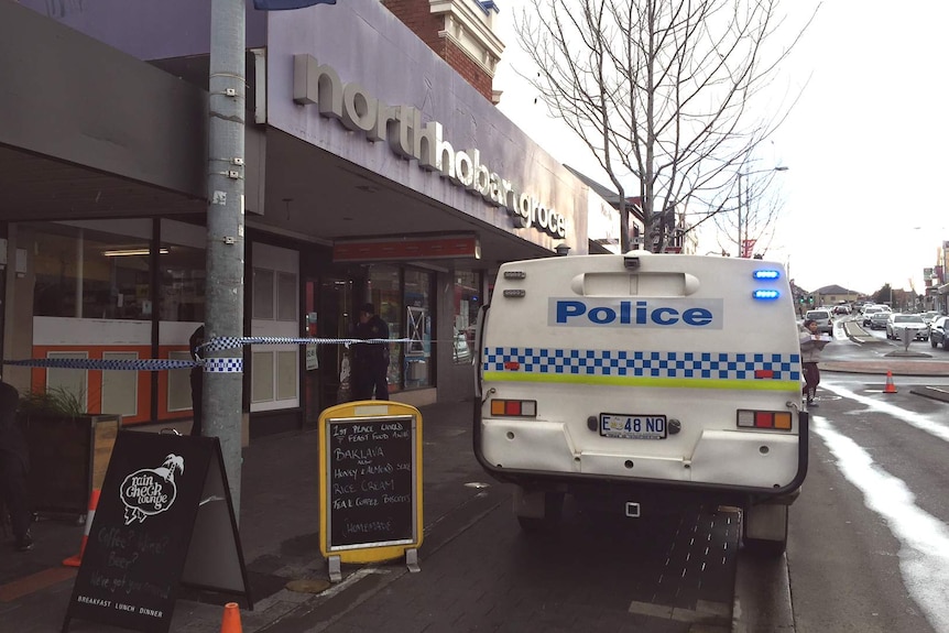 A woman dies after being stabbed inside the North Hobart Grocer