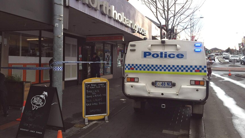 A woman dies after being stabbed inside the North Hobart Grocer