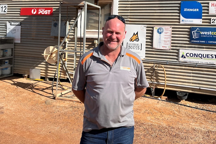 Owner of the Yelbeni Store Phil Hutchison stands outside his shop.