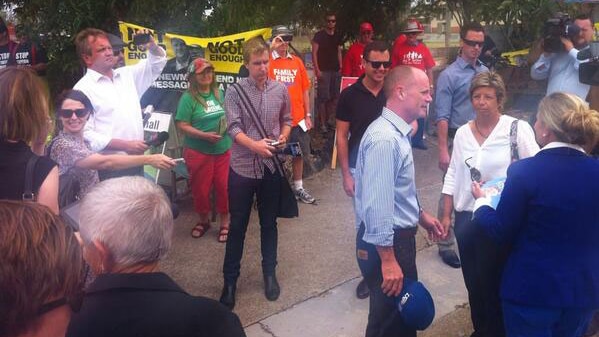 Unions loudly harangue Qld Premier Campbell Newman at a polling booth in the Redcliffe by-election
