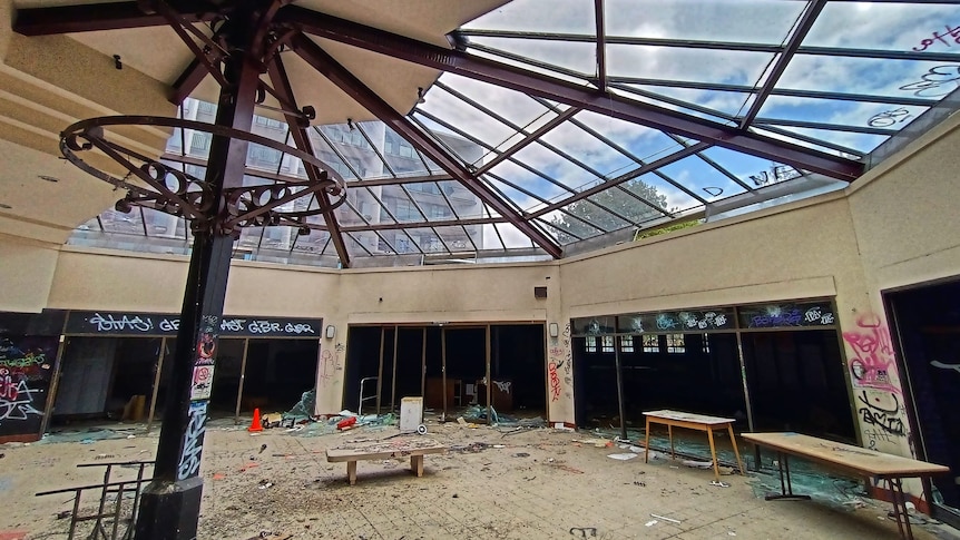 The inside of a trashed shopping mall