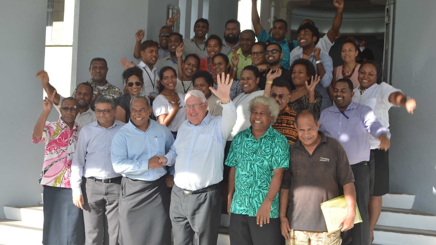 Fiji Times staff celebrate the court victory