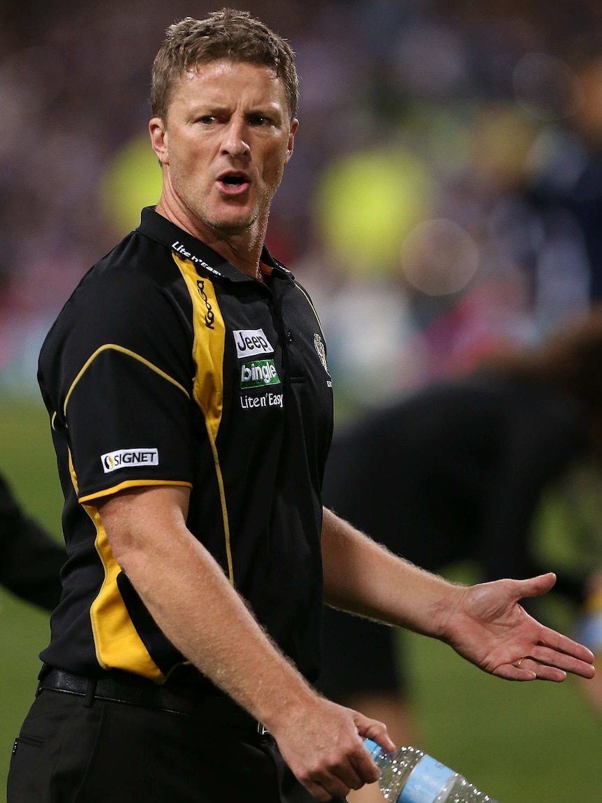 Not happy ... Damien Hardwick walks across the playing pitch after the loss to the Dockers