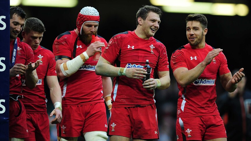 Welsh players celebrate their Six Nations win over Ireland