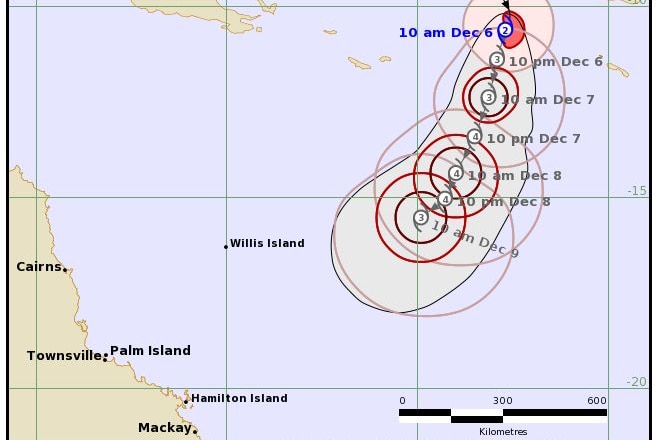 A map shows a cyclone moving towards Queensland