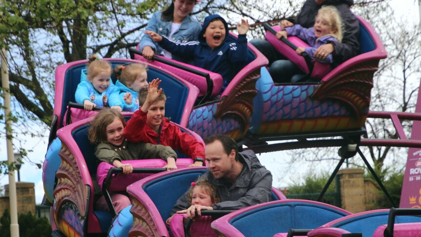 Children on a ride at the royal show.