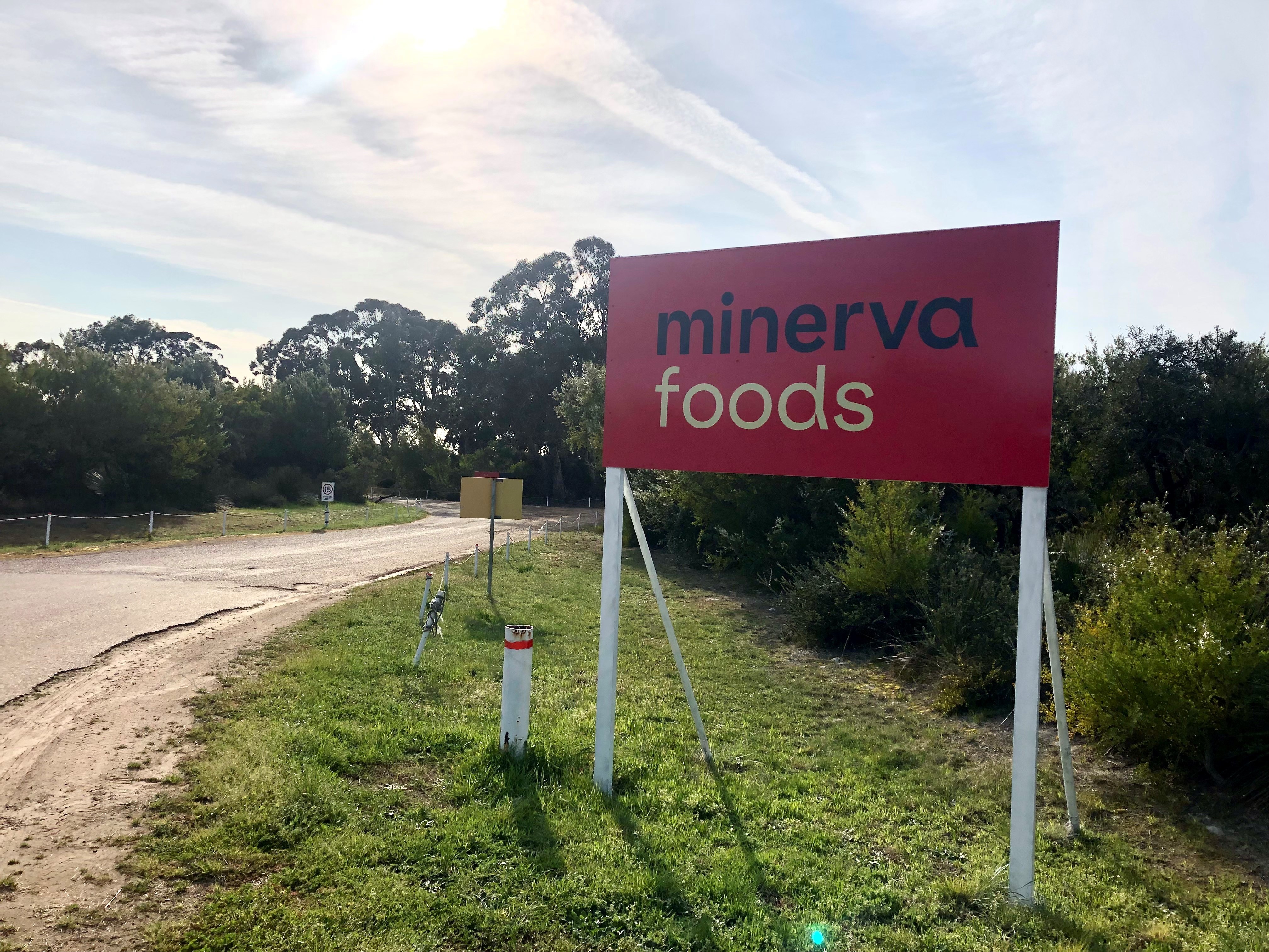 A sign saying Minerva Foods