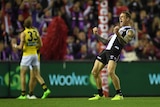 Tim Membrey of the Saints (right) reacts after kicking a goal against Richmond at Docklands.