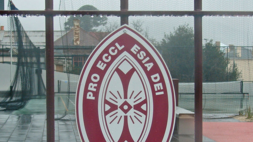 Logo on gate outside Collegiate girls school in Hobart, Tas.