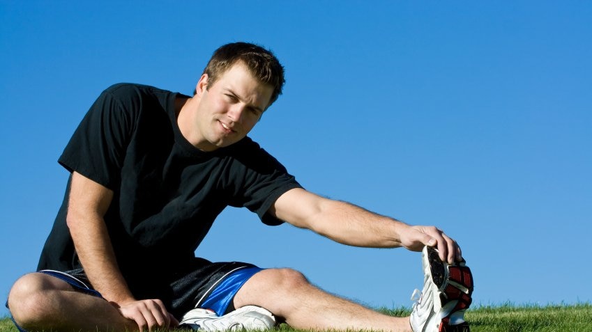 A man stretching before a going for a run