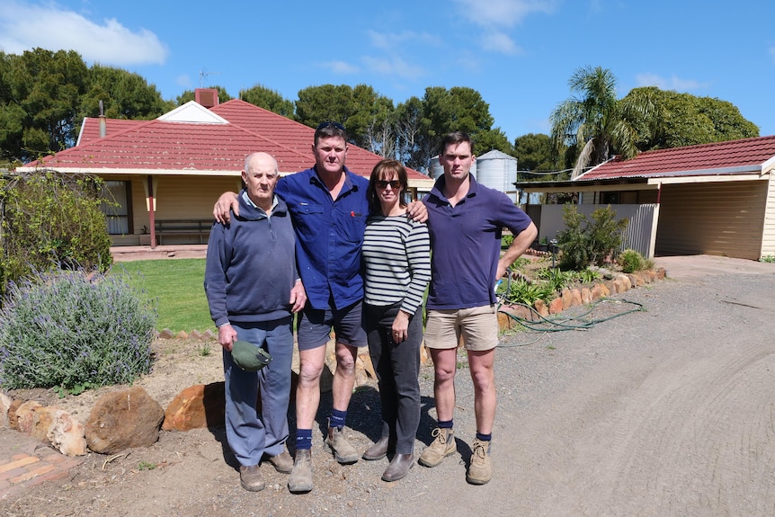 Johns family on driveway