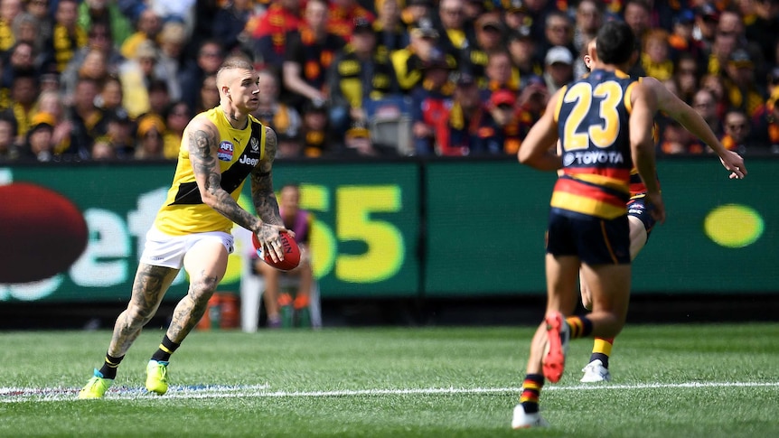 Richmond's Dustin Martin assesses his options in AFL grand final
