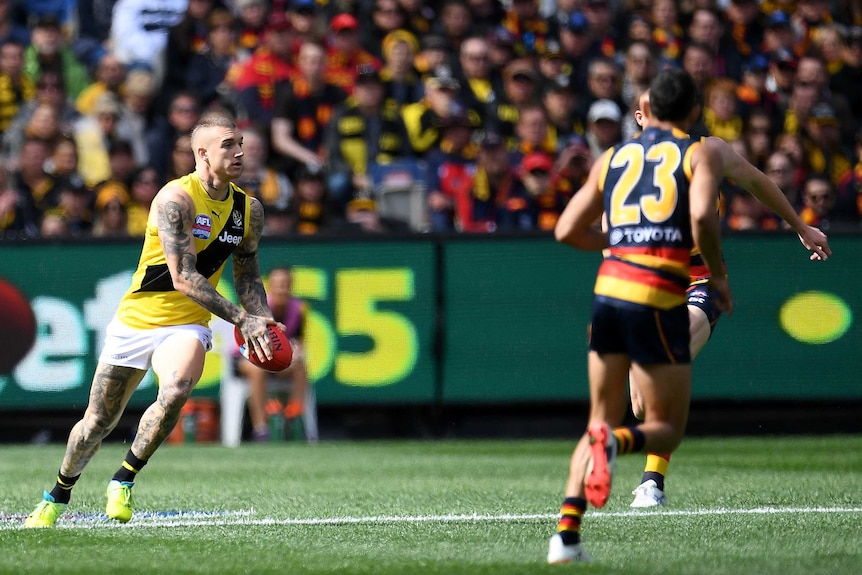 Richmond's Dustin Martin assesses his options in AFL grand final