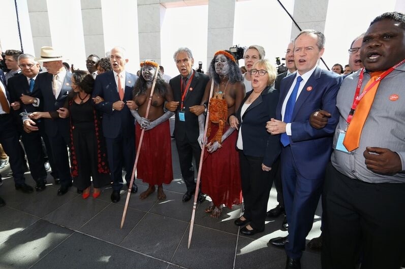 Malcolm Turnbull and Bill Shorten link arms in No More anti-family violence campaign