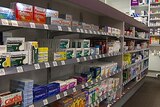 Drugs lined up on pharmacy shelves