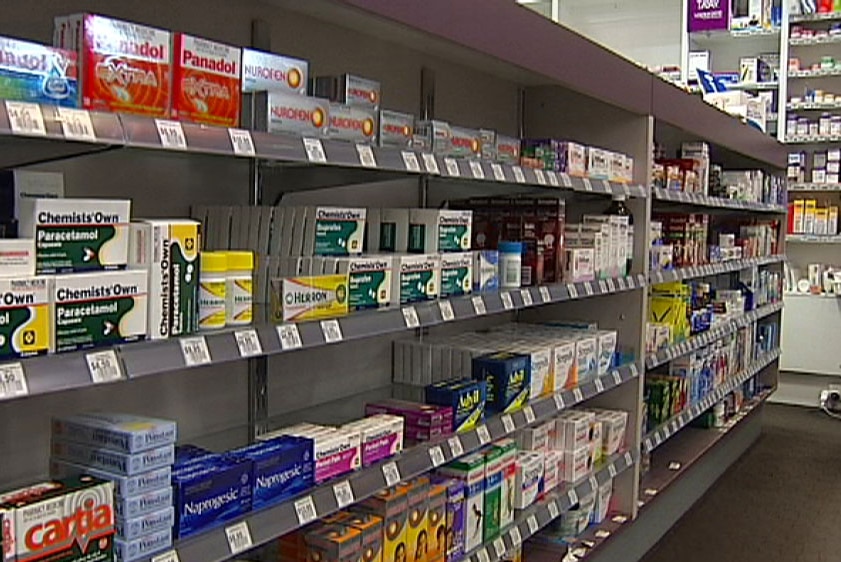 Drugs lined up on pharmacy shelves