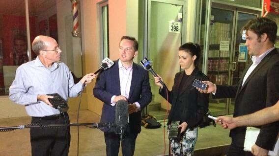 Labor's Chris Bowen talks to reporters after retaining is western Sydney seat